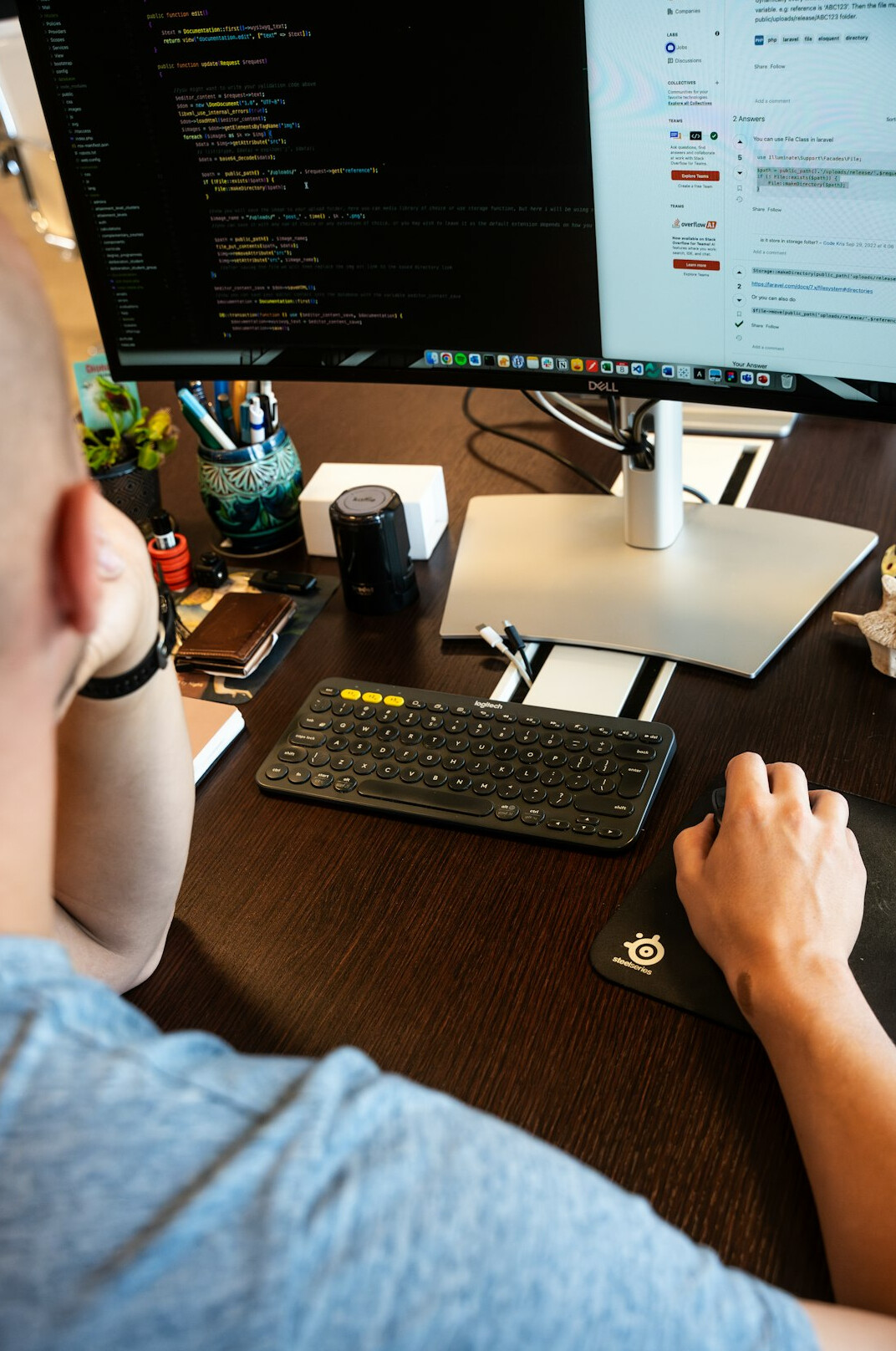 programmer writing code at desk