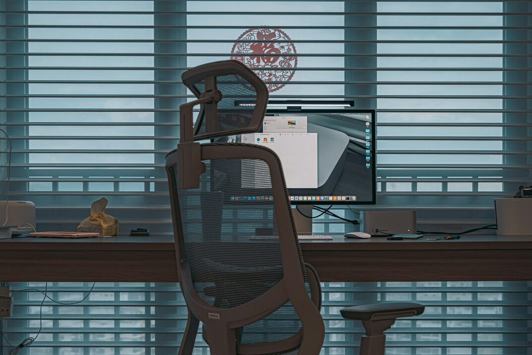 futuristic office with AI screens